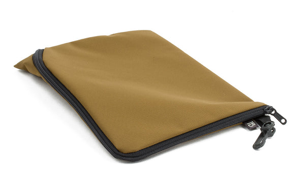 An A5 Ghost Whale Pouch in Coyote (golden tan).